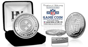 Silver Steelers NFL game coin with packaging and certificate of authenticity on a white background