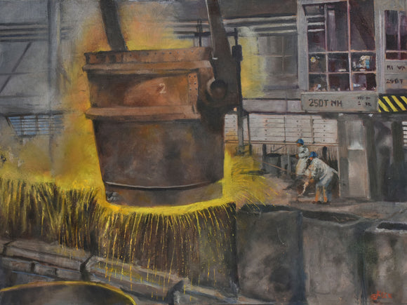 Industrial scene with a large metal bucket being handled in the Duquesne Works steel mill in Pittsburgh, PA